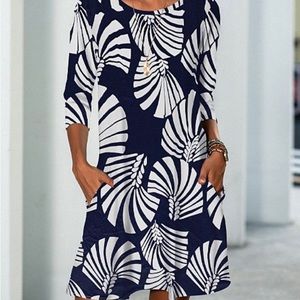 Summer light weight dress for garden parties or BBQs.